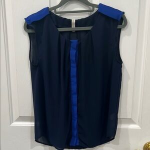 Navy Blue Sleeveless Blouse with Rounded Neckline and Hidden Buttons